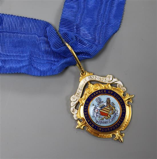 An 18ct gold and enamel Manchester Chamber of Commerce medallion, with sash.